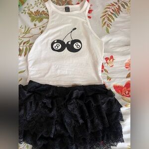 Cherry tank top with ruffle trim shorts